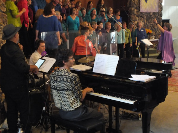 Kath Robinson directing choir